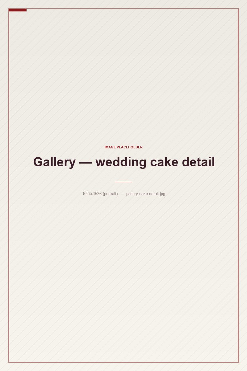 A tiered wedding cake with delicate floral detailing
